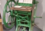 A printing press producing local newspapers